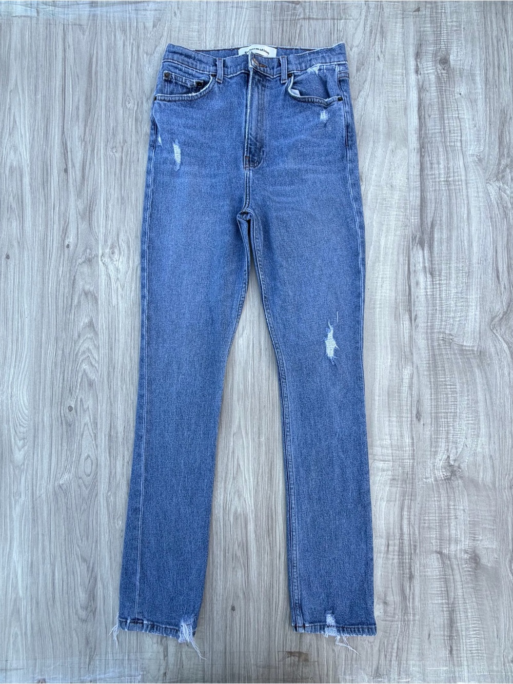 Reformation high-rise distressed jeans